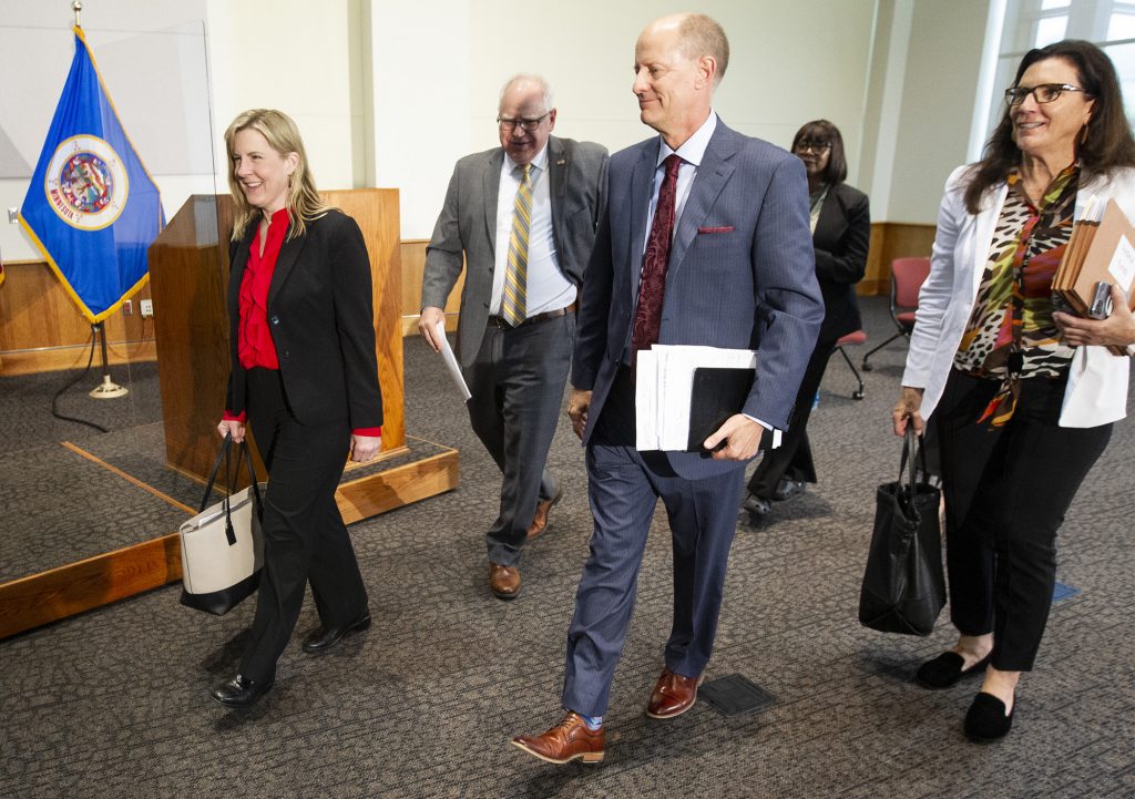 House Speaker Melissa Hortman, Governor Tim Walz, Senate Majority Leader Paul Gazelka and Senator Julie Rosen leaving a press conference