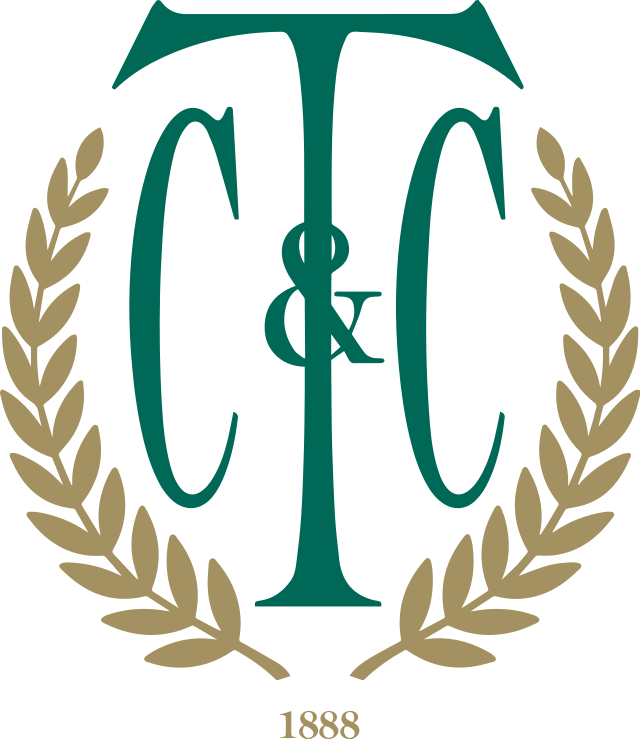 Town & Country Club logo of initials surrounded by olive branches and 1888