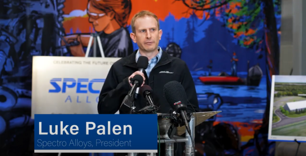 Spectro Alloys President Luke Palen speaks at a podium.