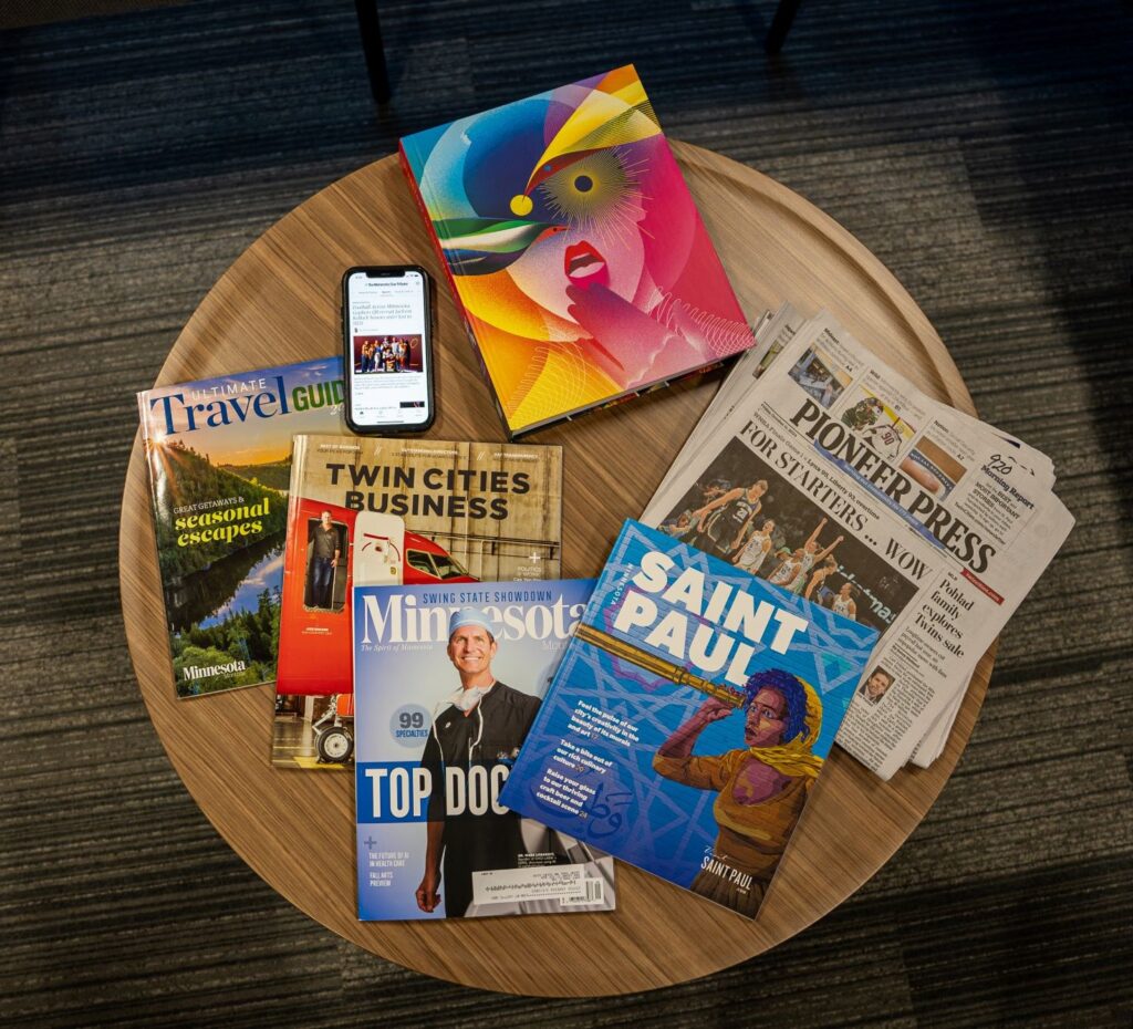 Minnesota news publications sitting on a table