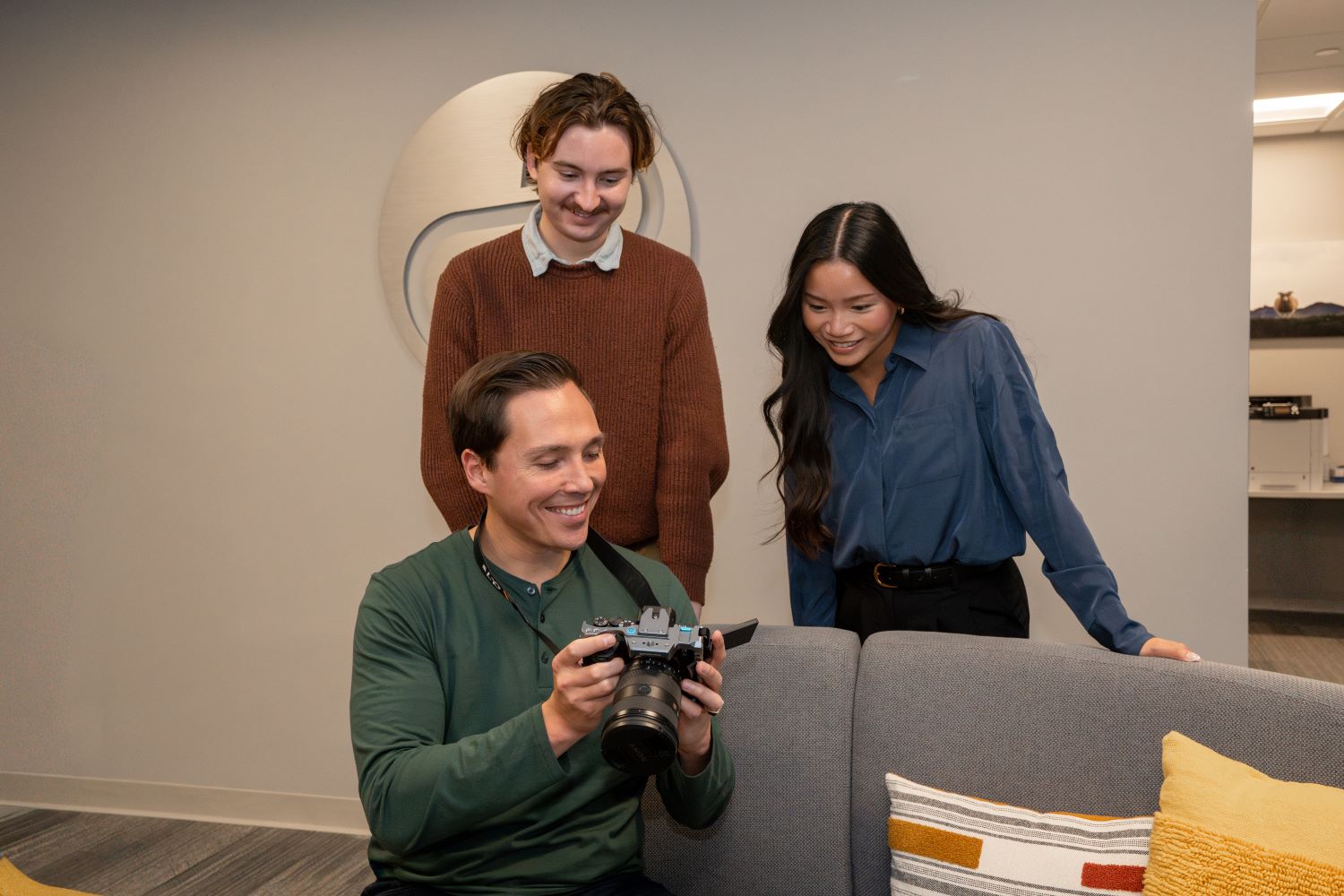 Three Goff Public employees looking at a camera